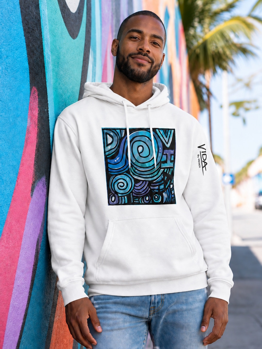 Marea artwork by Mènek on a white VIDA hoodie